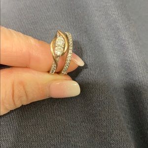 2 stones diamond ring and a diamond wedding band.